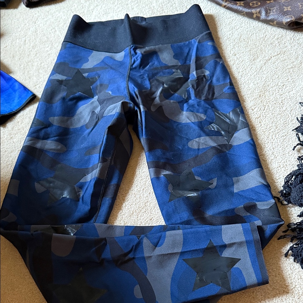 Ultracor Blue and Black Camo Leggings this is not kids.   The photo says kids